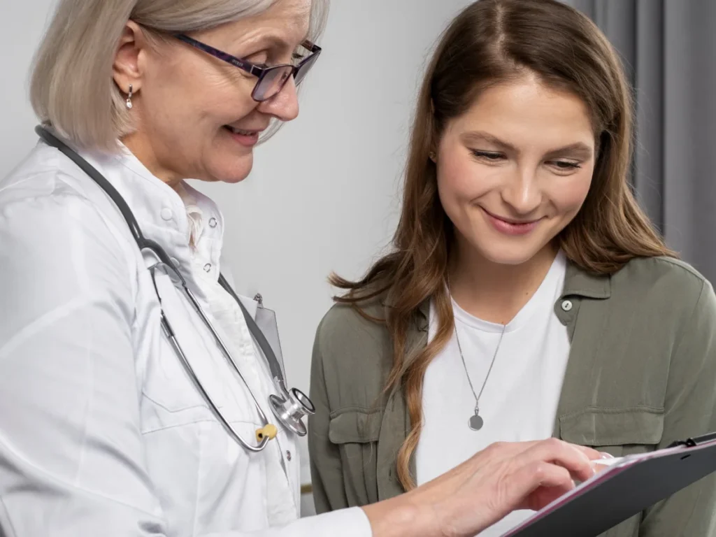 Naturopath showing lab results to a patient