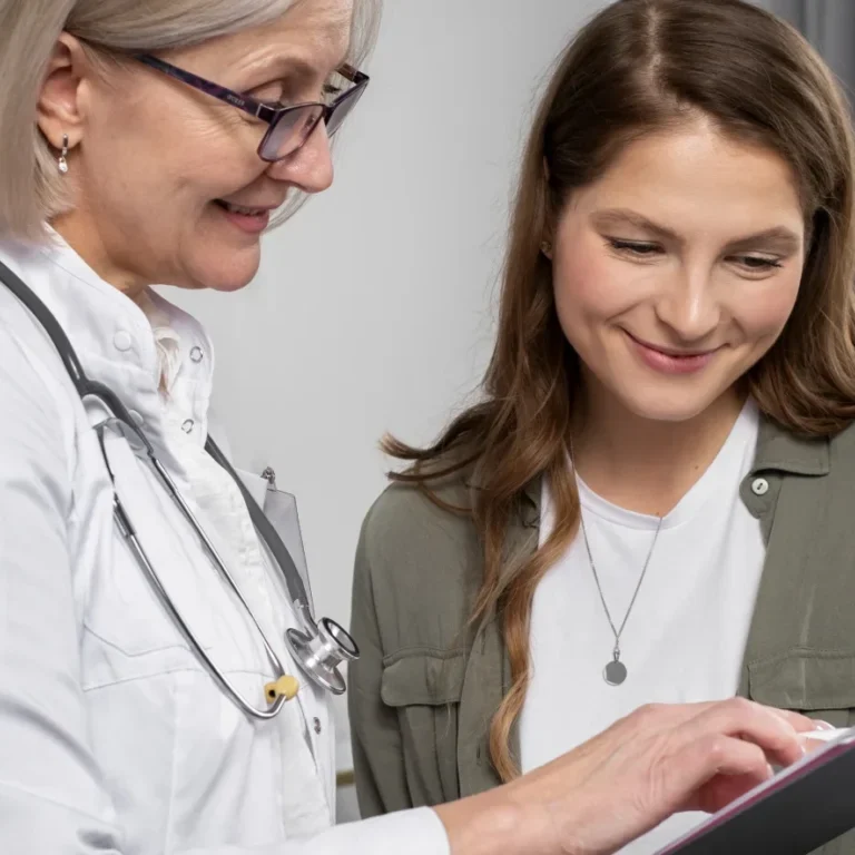 Naturopath showing lab results to a patient